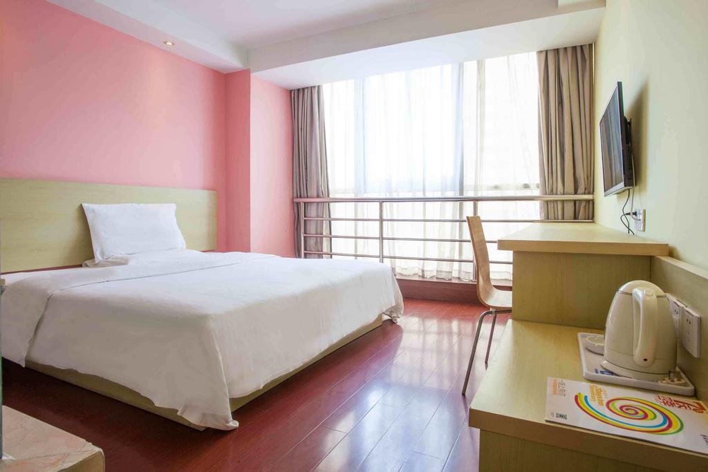 7 Days Inn Heze Mudan Road Branch Стая снимка